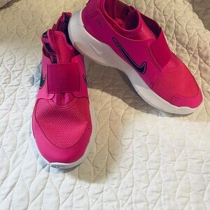 Nike Kids Bright Pink Slip-On Sneakers with White Sole and Black Swoosh